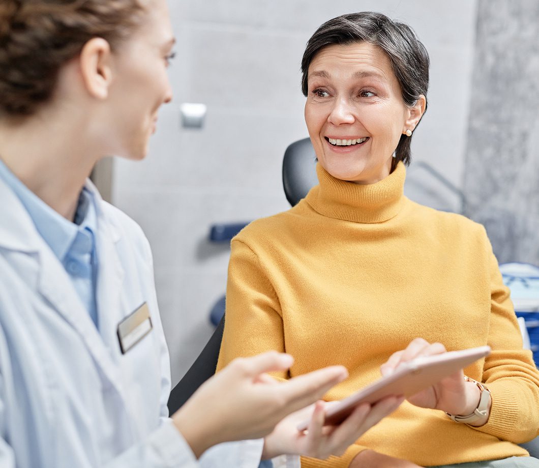 Patient smiling during a consultation